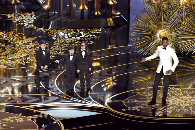 Chris Rock no Oscar 2016, durante piada com asiáticos